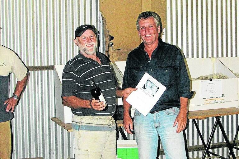 HANDY HOGGET: Dean Pearson, Brinkley, who won the combined wool and carcase value at the recent Monarto Hogget Competition, is pictured with Classings P/L’s Bill Walker.