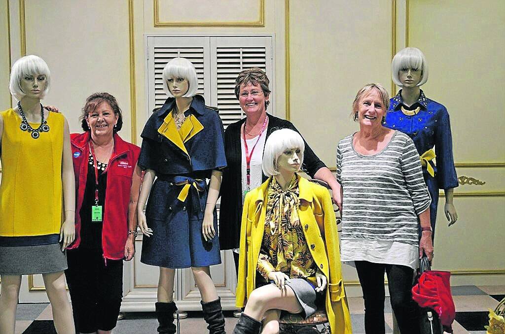 DISPLAY MODELS: The Sunshine Mill has state-of-the-art showrooms which display fashionable clothing all made by the company, Helen Bates, Jackie Pendergast and Penny Barry, all from Gippsland, Vic, pose among the display models.