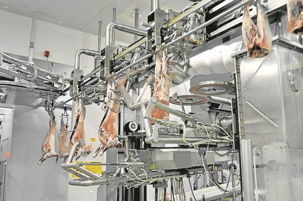 QUICK WORK: JBS Australia's new automated x-ray primal machine installed in the Bordertown boning room is capable of processing up to 10 lambs a minute.