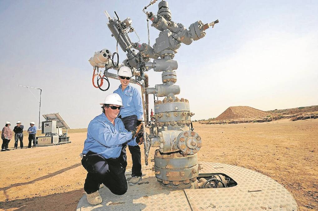 GROWTH PLAN: Production operator Brendon Ireland and team leader Khalee Field at the October 2012 launch of the Santos Moomba-191 wellhead, Cooper Basin. SA sees mining as a major wealth-creator for its economy.