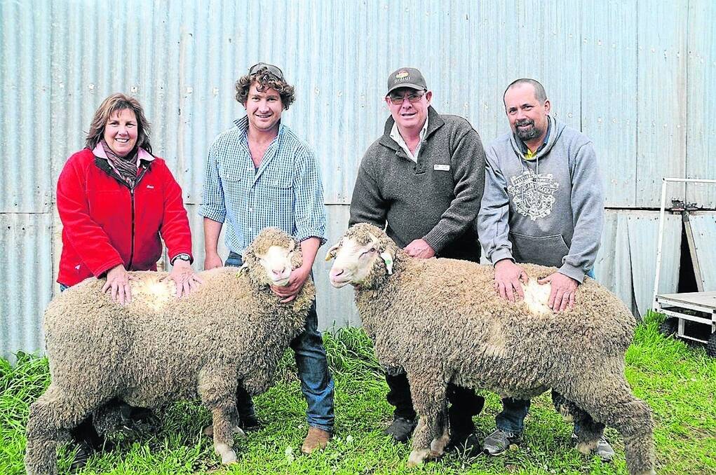 TOP TWO: Steph Brooker-Jones, Elders district wool manager for lower South East, Matt and Wayne Lehman, Flairdale Poll Merinos, and top-price ram buyer Daryl Frahn, Murray Bridge with the $4000 and $4100 rams.
