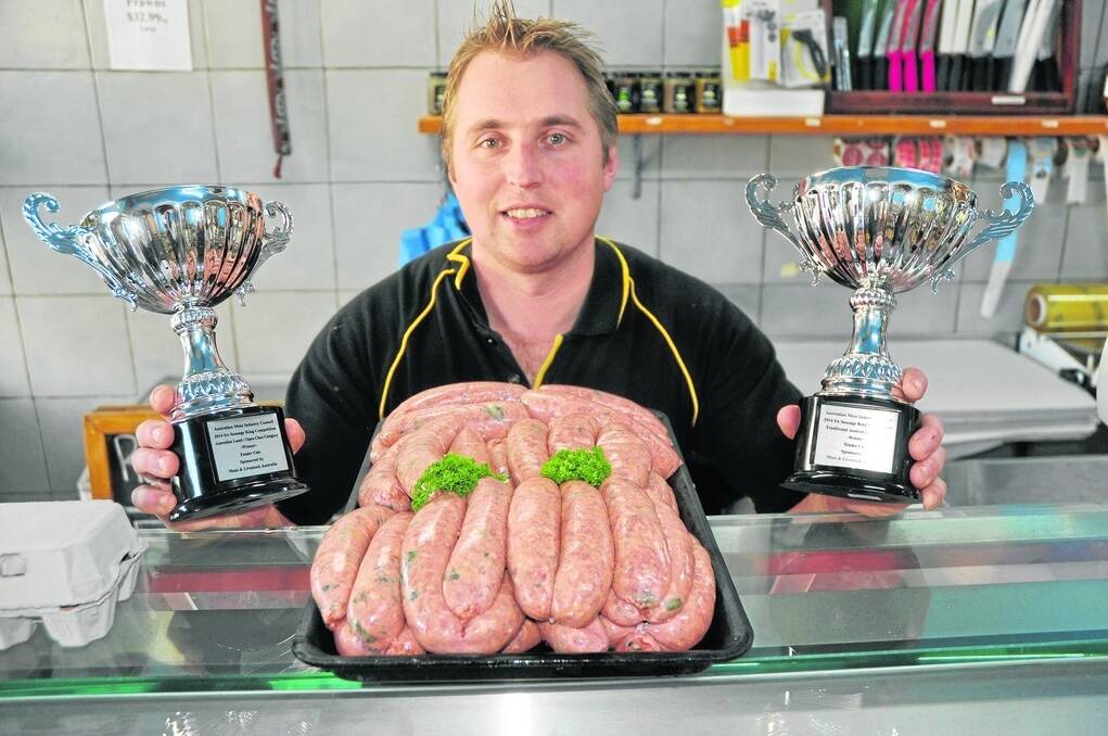SAUSAGE ROLL: Shaun Watson, Tender Cuts, Naracoorte, with the lamb, feta and spinach sausages that won SA’s best in the lamb class at the 2014 SA Sausage King awards. The business also won the Traditional Australia class with its BBQ Butcher Sausages.