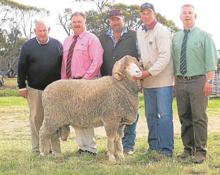 TOPPER: Pictured with the $11,000 top-price ram at White River, Poochera, are White River's John Daniell, Elders auctioneer Craig Shearer, buyer Paul Carey, Talieka Pastoral Co, Streaky Bay, White River's Wes Daniell and Landmark auctioneer Gordon Wood.