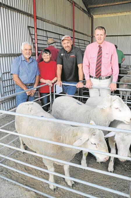 MEATY RAMS: Coonalee principals Lyal and Anne-Maree Zanker, top-price ram buyer Craig Rowsell, Keith, and auctioneer Elders Keith’s Dean Coddington. Mr Zanker said the stud’s goal was to breed rams with good size and length and meat.