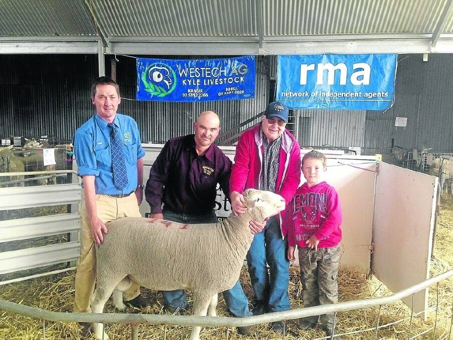 SPECIAL SELECTION: Duenclin sale agent Westech Ag Kyle Livestock’s Stuart Kyle  with Duenclin stud principal Clinton Huxtable and Ross Dodson, Kaniva, Vic, with his grandson Hunter. Mr Dodson who bought one of the specially selected White Suffolk rams at $1300.