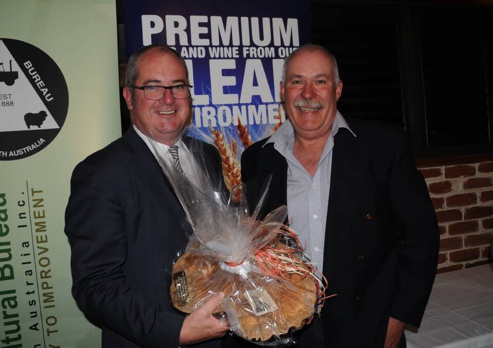 LONG SERVICE: Agriculture Minister Leon Bignell with internationally renowned grains expert Andrew Barr who was recognised for his services to primary production. 
