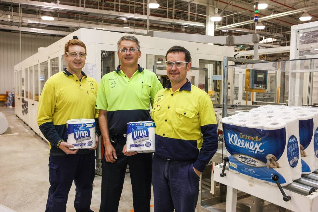 PRODUCTION BOOST: At Kimberly-Clark Australia’s Millicent Mill are rolled products operator James Scott, mill manager Scott Whicker and operations manager Adam Carpenter. The extra funds will spike up Kleenex production at the site.