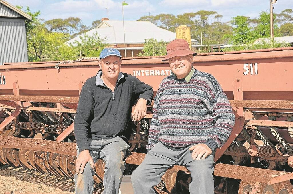 ON TIME: Rodney Schubert (right) is committed to saving machinery that were part of the evolution of the farming industry from becoming scrap. He is with Loxton farmer Ian Cass who is among the group involved in the Loxton Museum of Farming and Horticulture Technology set up to preserve the history.