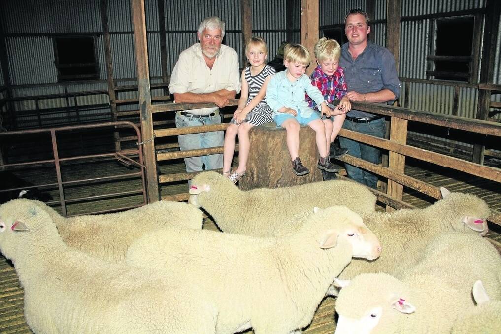 THREE GENERATIONS: Frank and Shaun Watson and Shaun’s children Lily, George and Bernie with some of the lambs which are destined to be sold under their new Watsons Lamb brand.
