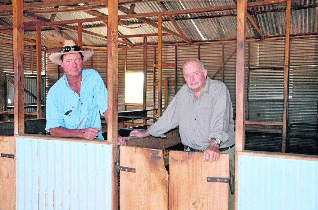 WOOL STOP: David ‘Jacko’ Grace with his father Bill at the main woolshed on Milpara, South Anabranch, NSW.