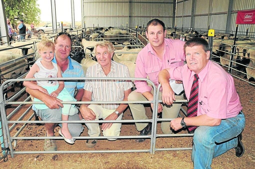EP BUYERS: Andrew Bates and daughter Holly, Seaton Park Suffolks, Butler Tanks on Eyre Peninsula who bought 50 ewes,14 ram lambs and two stud rams, are with Broughton Lodge stud principal Anthony Duffield. Elders’ Paul Kilby,  and Elders auctioneer Tony Wetherall