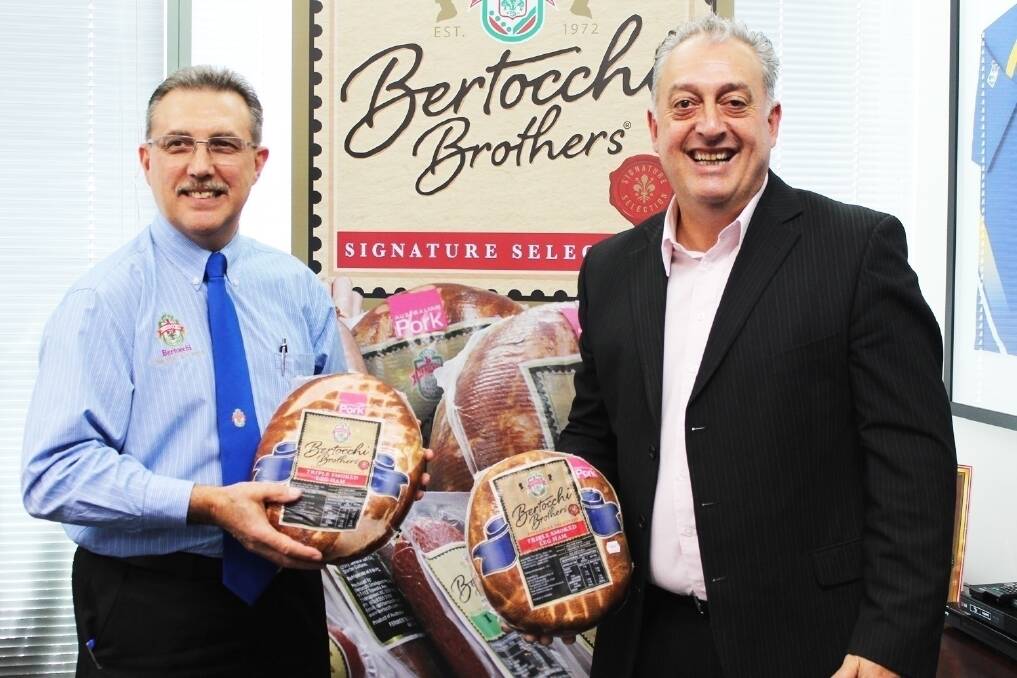 Bertocchi’s Tony Rappone and Frank Di Virgilio with their winning hickory-smoked ham.