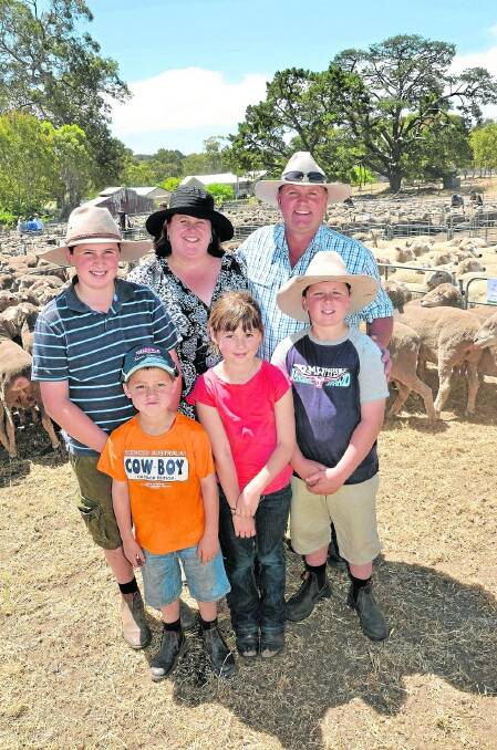 SHEEP DISPERSAL: The Jaeschke family Glen Rufus Park, Eden Valley, held a full dispersal of their 420 sheep at the Mount Pleasant first-cross and off-shears sale on Wednesday last week. Pictured are Jacob, Caleb, Kate, Ebony, Andrew and Thomas. The family’s 1.5yo and 2.5yo Merino ewes sold to $150 and their 3.5yo sold to $148. Andrew said he planned to concentrate on his Santa Gertrudis stud.