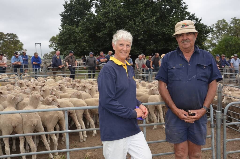 Sue and Don Phillips, Langhorne Creek, were after "all the stores we can get" and paid $90 for this pen of Merinos.