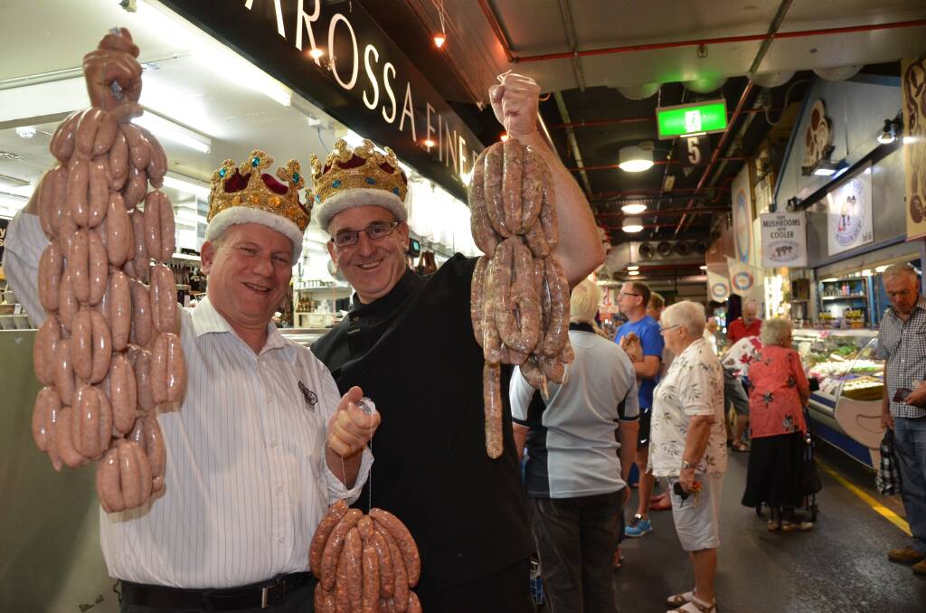 Barossa Fine Foods director Franz Knoll and Bruce’s Meats owner Trevor Hill, pictured in the Adelaide Central Market, are hoping their gourmet sausages will be crowned the nation’s best in the National Sausage King finals in Adelaide this weekend.