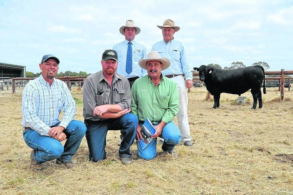 Stoney Point stud principals John Gommers and Perry Gunner (standing at right) with buyers of the $9500 top-price bull Stoney Point Juggernaut at the stud’s seventh annual sale Aaron Woods, Kangaringa Station, Keith, and Landmark Keith manager Noel Evans. Also pictured is (standing left) Spence Dix & Co director Jonathan Spence. Kangaringa bought five bulls av $4900.
