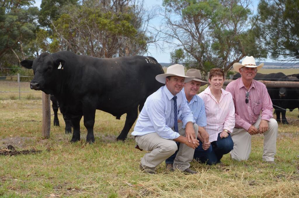 Jono Spence, Spence, Dix & Co, Keith, buyers Tony and Helen Donohue, Ulmarra Simmentals, Singleton, NSW, and Lancaster Black Simmentals co-principal Tim Cartledge, Meningie, with the $16,000 LCS Jackal J161.