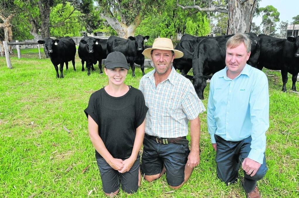 Samantha and Ben Glatz, Glatz’s Black Angus, Avenue Range, are congratulated as overall winners of the ANZ Heifer Challenge, by ANZ agribusiness manager – southern ports region – Darren Dean.