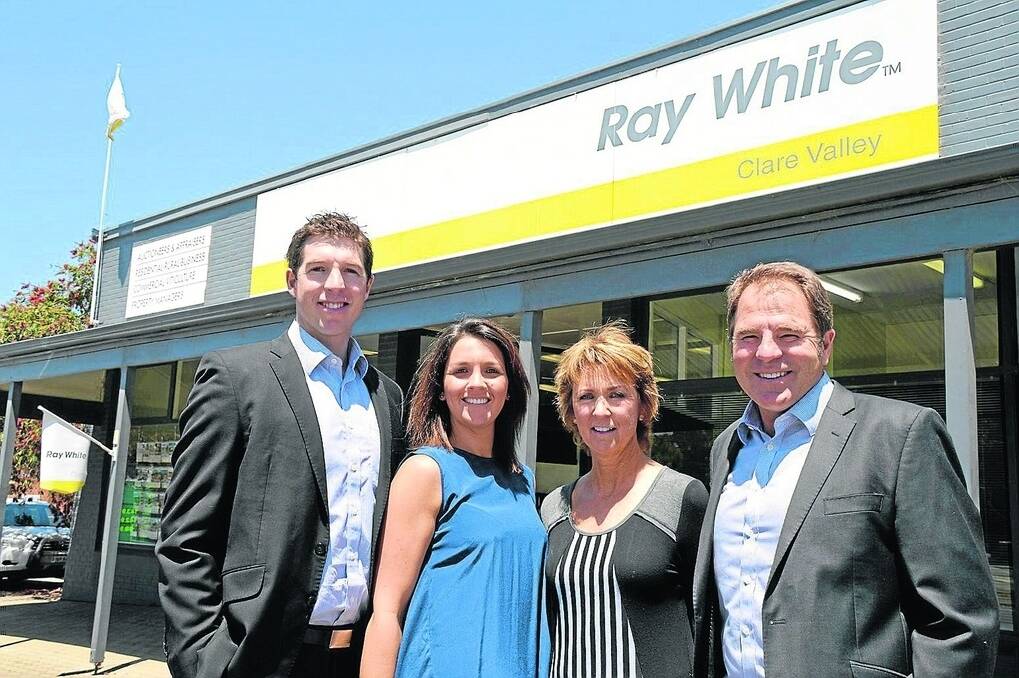 Daniel Schell, wife Rebecca, mother Karen and father Geoff at the Ray White Clare Valley office, which the Schells took ownership of last year.
