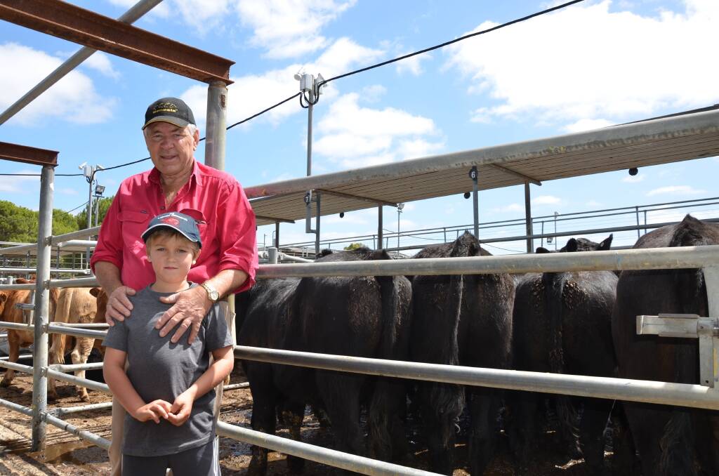 Mick Moros, Strathalbyn, with grandson Toby Moros, Beachport,. Mick bought a pen of 17 Angus steers for $710 each.