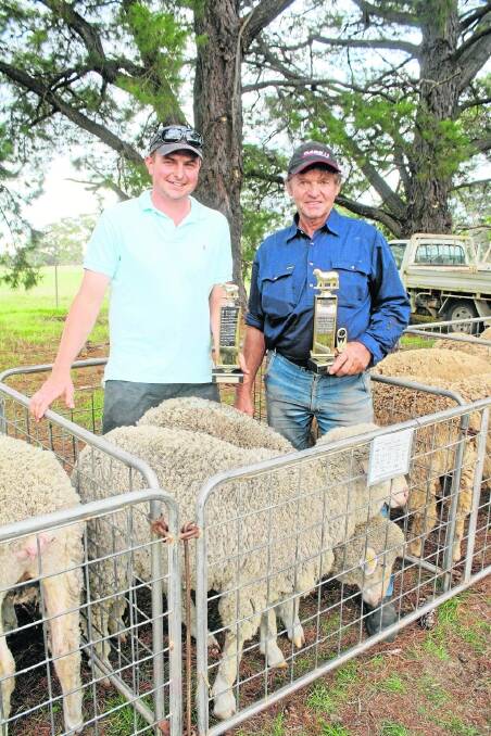 TOP HOGGETS: The 2014 judge Tom Davidson, Moorundie Park, Gulnare, at the competition last year with the winner of the open pen of three hoggets and hogget of the day, Gerald Woidt, Coomandook. Gerald will speak at an on-the-couch session at this year’s event.