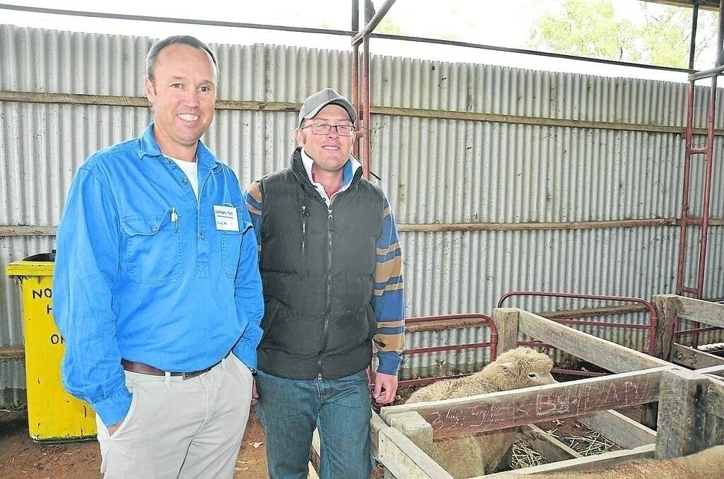 CATCH UP (left): Hills Farm Supplies Anthony Pearce with one of the day’s organisers Sam Edwards, Imperial Romneys and Suffolks, Mount Pleasant.