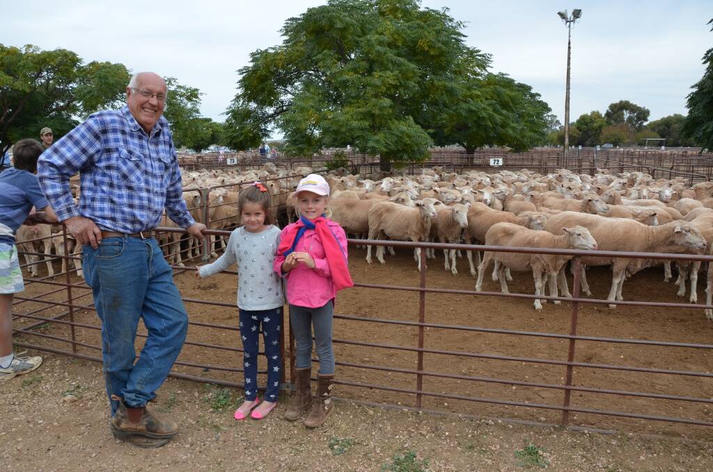  Leith Cooper, Jamestown, took his granddaughters Sarah and Zara to the Jamestown market on Thursday.