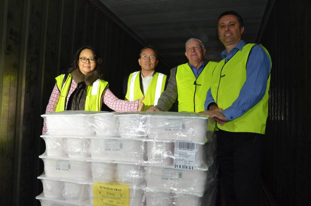 President of Globe Success International Transportation Christina Xu, Shenzhen City, China, exporter John Zhang, Wunder Australia, Sydney, NSW, Golden North director Ken Smith and general manager Peter Adamo in the truck with the first shipment bound for China.