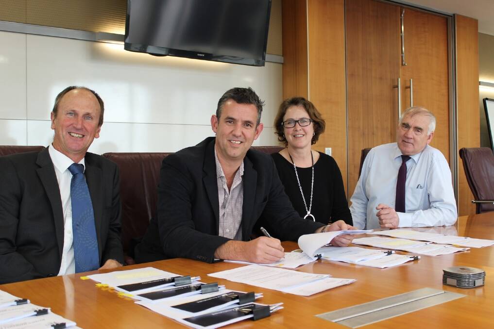 At the signing of the contracts yesterday were CBH Group director and Investment Committee chairman Trevor Badger; Blue Lake Milling CEO Ben Abbot and business development manager Lindy Cook Business; and CBH Group chairman Wally Newman.