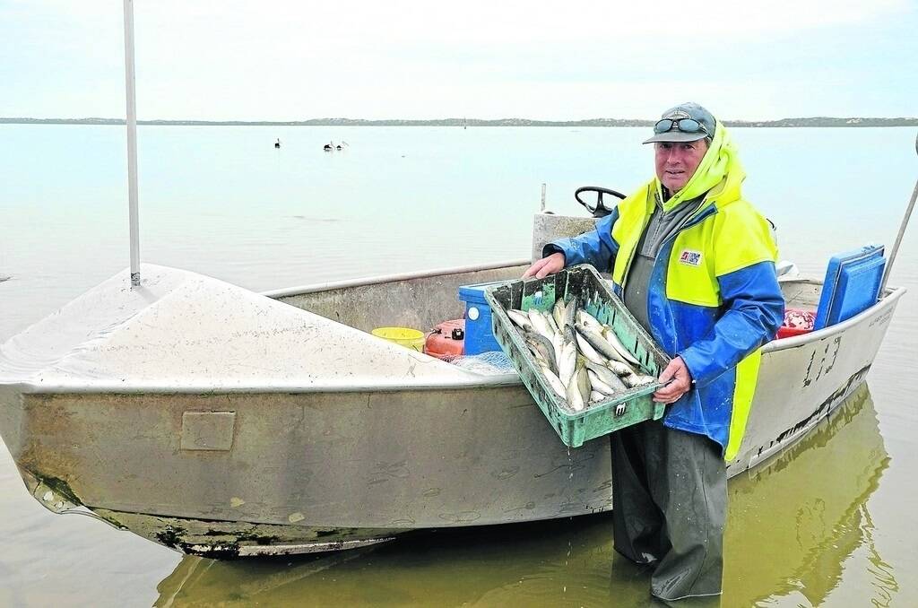 Garry Hera-Singh with a catch of Coorong mullet.