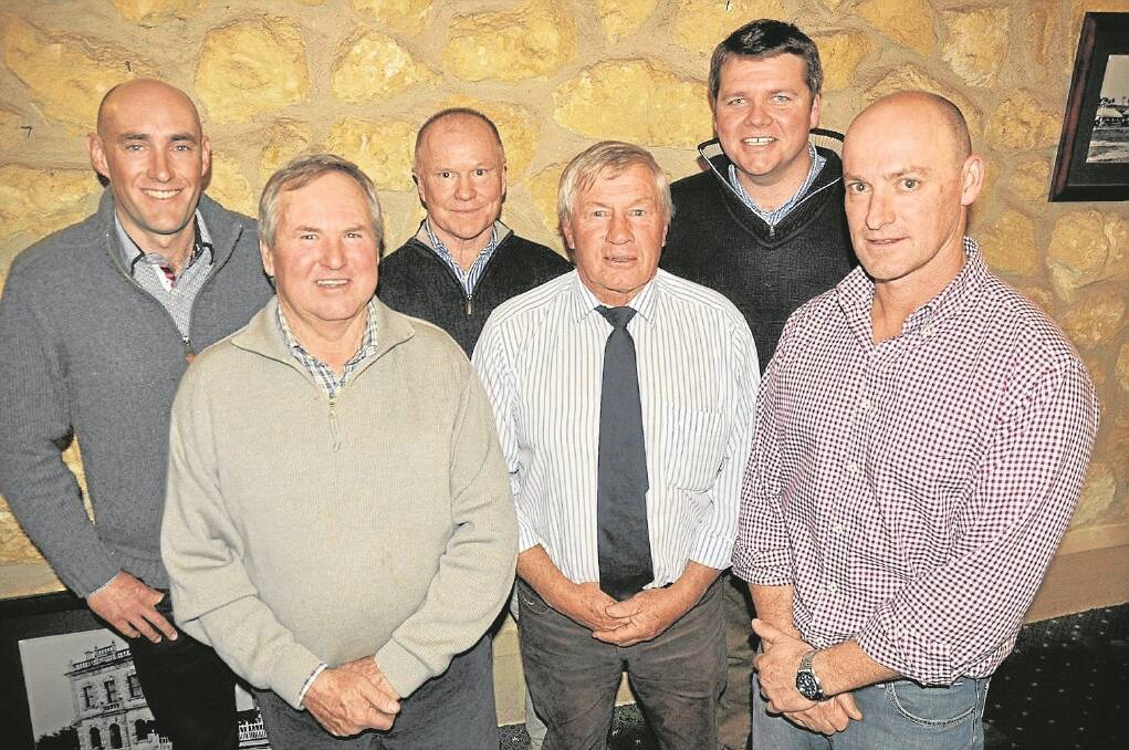 Livestock SA vice-president Jack England, board members Andy Withers and Steve Radeski and president Geoff Power congratulate Livestock SA southern region chairman Peter Stock and southern region secretary Tom Dawkins on being re-elected.