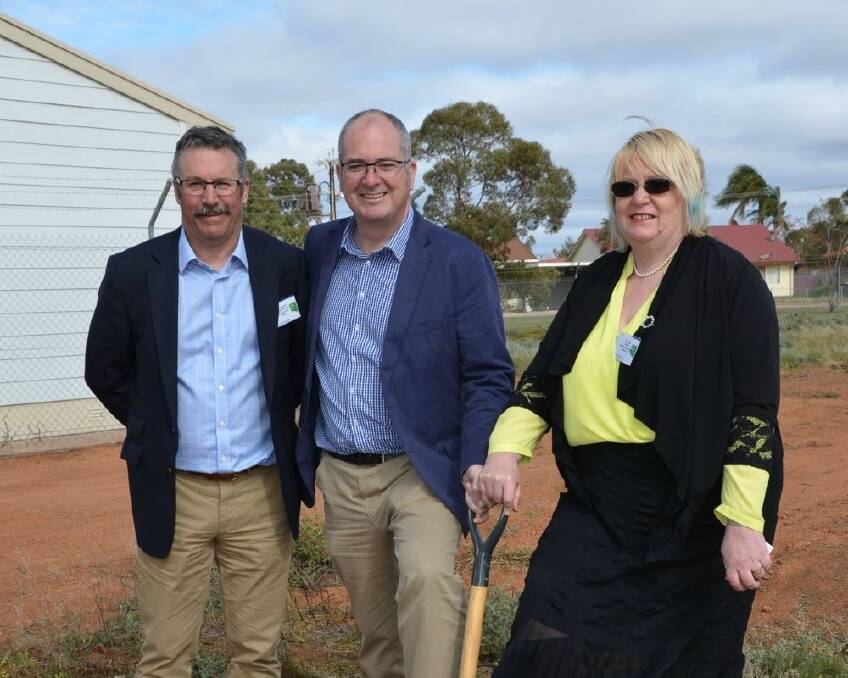 Biosecurity SA executive director Will Zacharin, Agriculture Minister Leon Bignell and Horticulture Innovation Australia's Sue Finger dig the first hole for the construction of the National Sterile Insect Technology facility at Port Augusta last week.