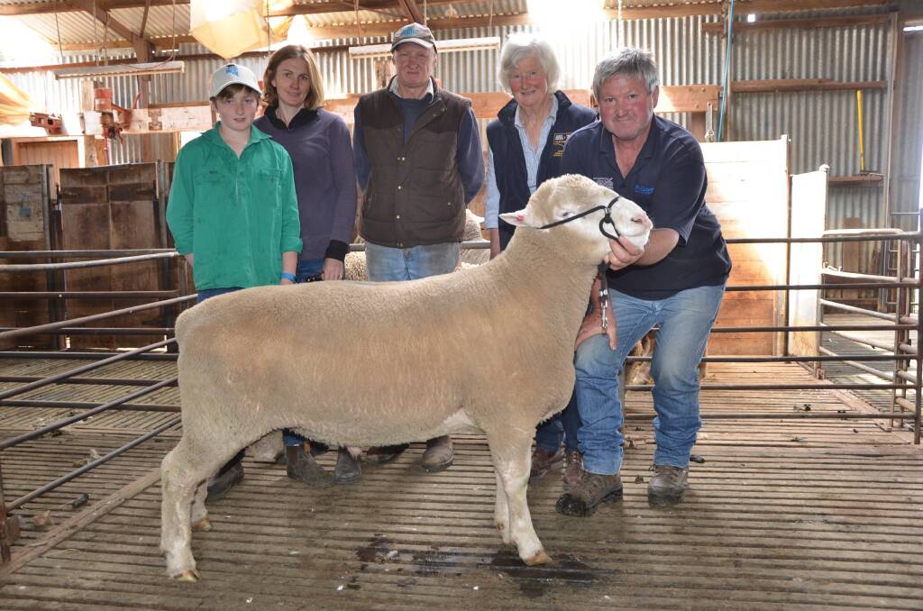 Buyers Dugald, Julie and Alexander MacLachlan, Myponga, with Illawong principals Charlotte Morley and Ross Hamilton, Parawa, and the top-price Poll Dorset ram.