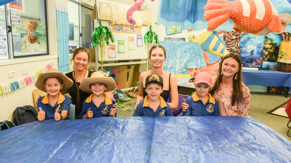 WHALE OF A TIME: The students and their governesses sit in the under the sea themed Year 2 classroom.