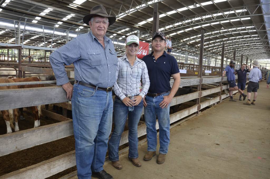 Lance Chaplin, Woods Well, his granddaughter Shauna Chaplin and her dad Danny Chaplin were on hand to see Shauna's 12 Angus steers sell for $1460.