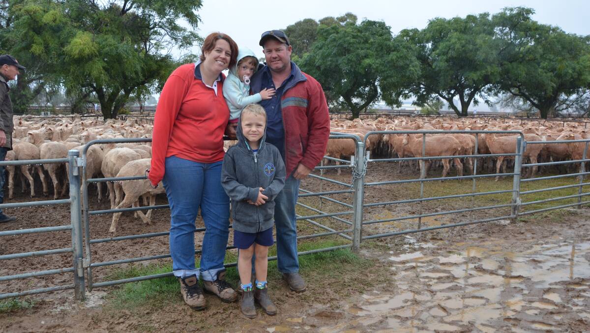 Braving the wet weather at Jamestown on Thursday last week were Angela and Alex O'Loan, Mallala, with their children Catriona, 3, and Callan, 5.