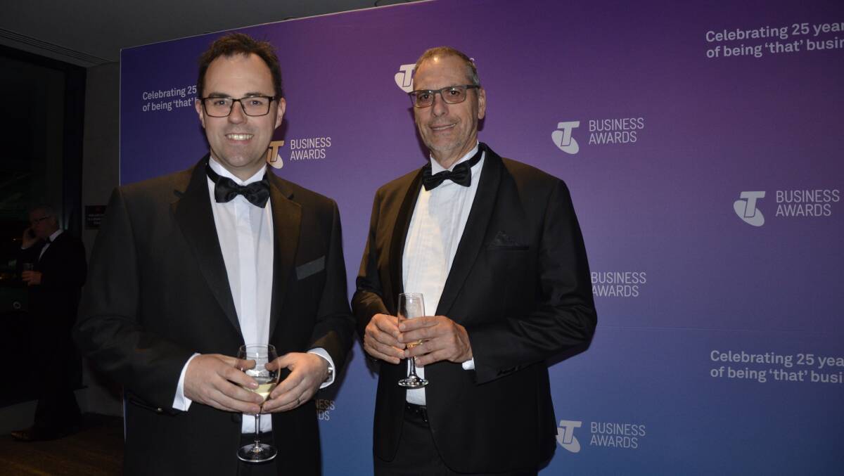 Telstra's Chris Marks with LV Dohnt & Co Pty Ltd managing director Phillip Dohnt, who won the medium business award.