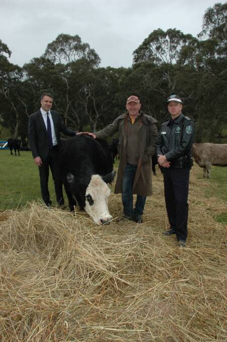 Police Minister Peter Malinauskas, Mount Barker Springs grazier Malcolm Williams and SAPOL Yorke and Mid North local service area officer in charge Scott Denny.