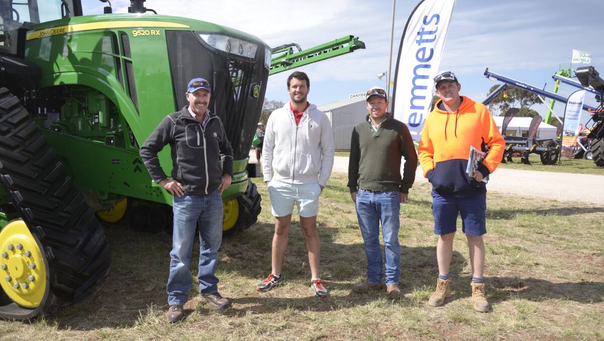 CATCH-UP: Farmers Linden Price, Narridy, James Venning, Bute, Rob Price, Redhill, and Jordan Green, Bute, caught up at the John Deere site.