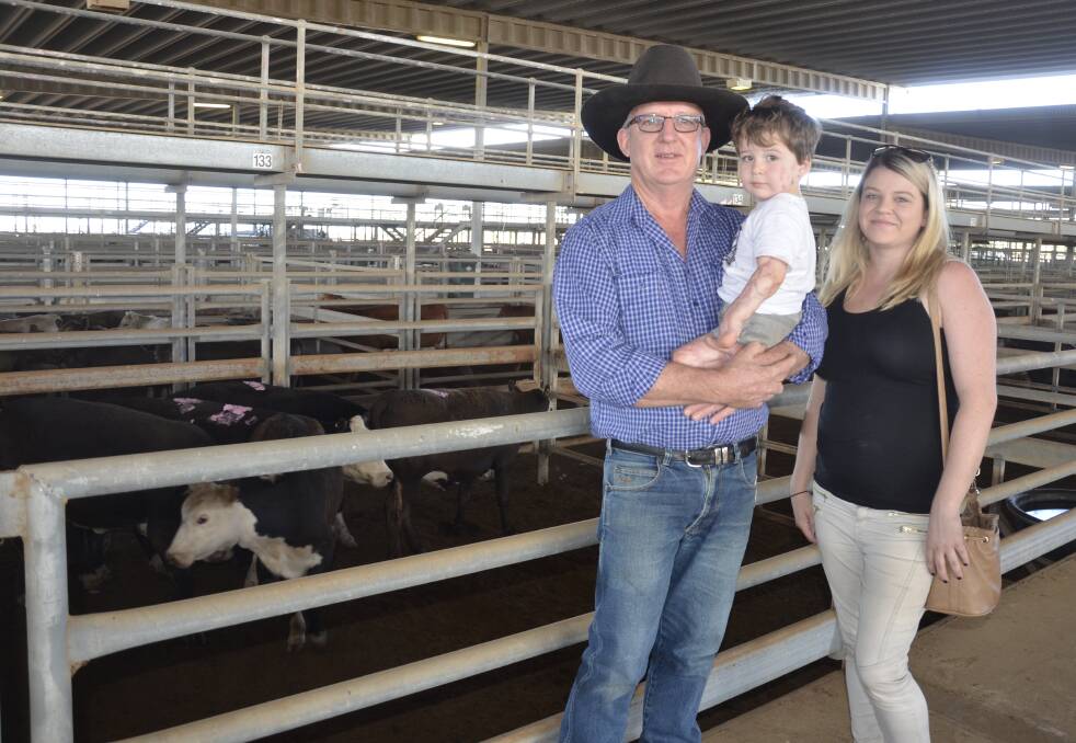 MARKET DAY: Trevor Nixon, Ardrossan, with his grandson Riley Nixon, 3, and Riley's mum Amy Wales at the Dublin cattle sale on Monday.