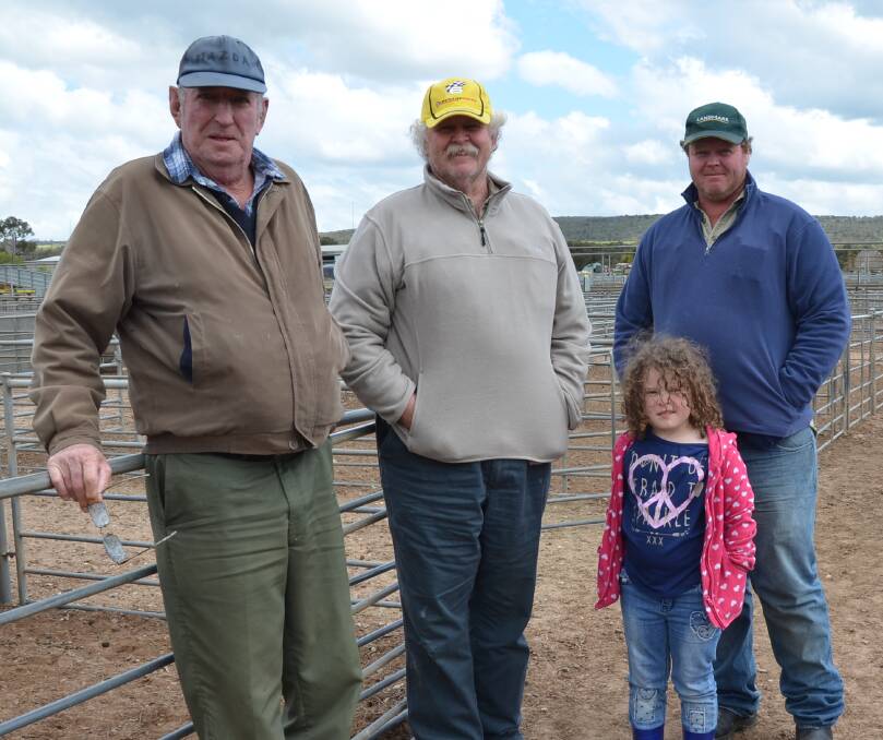 CATCH UP: Len Duell, Murray Bridge, with Kevin Spinks, Naturi, and his son Michael and granddaughter Tallera Spinks. Kevin sold 15 lambs at $96.
