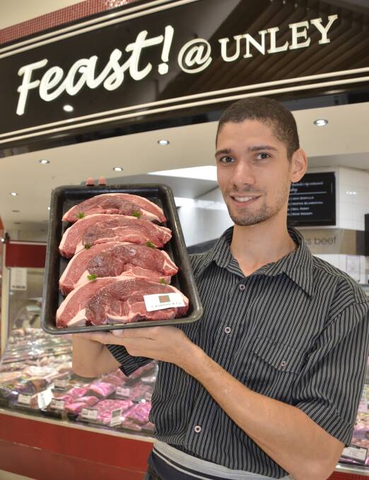 CONSUMER FOCUS: Feast! Fine Foods apprentice butcher Aithlea Munn with a tray of S Kidman & Co branded Santa Gertrudis rump steaks at the Unley store. It is also available at Norwood and the Adelaide Central Market.