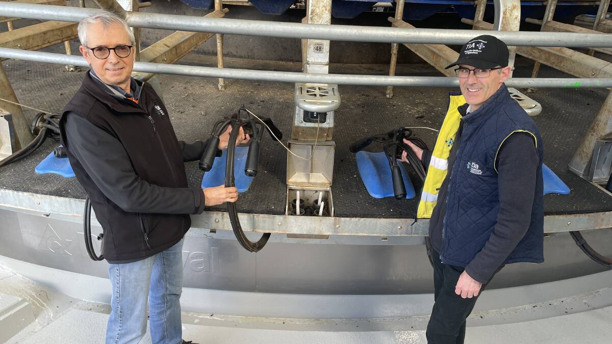 Tasmanian Institute of Agriculture research fellow, Pieter Raedts, and livestock production centre leader, James Hills, in the dairy at the Elliott Research Farm. Picture by Rodney Woods 
