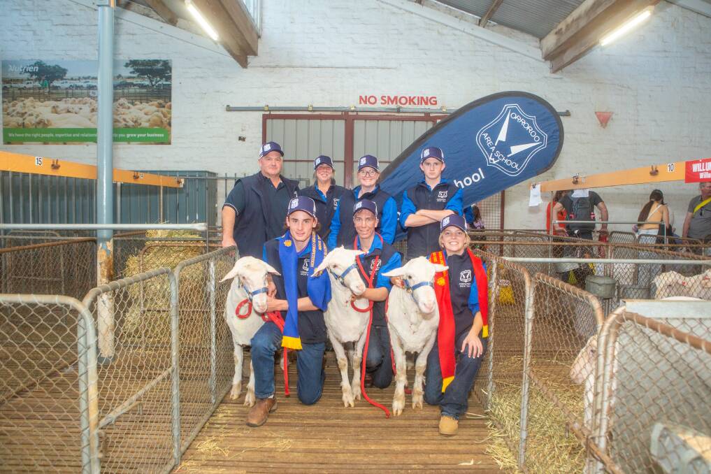Orroroo Area School students and teachers with their pen of three wethers which were awarded the best meat value in the wether competition. Picture by Jacqui Bateman