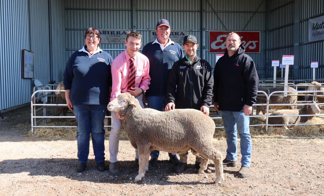 DOHNE SIRE: Buyer of the highest priced Dohne ram was Dickie Kroehn (right) from Sunnyvale Props, Eden Valley, with (back) Babirra stud principals Lynda and Craig Farrow and Elders' Adam Pitt and Nutrien Harcourts' Julian Burke.