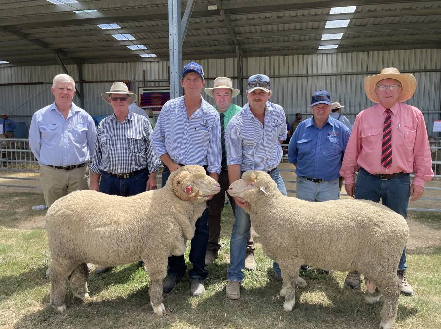 With two of the equal top-priced rams at $2800 are AWN's John Croake, Tony Gall, Wilson's Creek, Uralla, Des Carlon, Shalimar Park, Landmark stud stock specialist Brad Wilson, Jack Carlon, Reg Walls, McDonald and Co Livestock, John Newsome, Elders district wool manager, Glen Innes. Picture by Simon Chamberlain