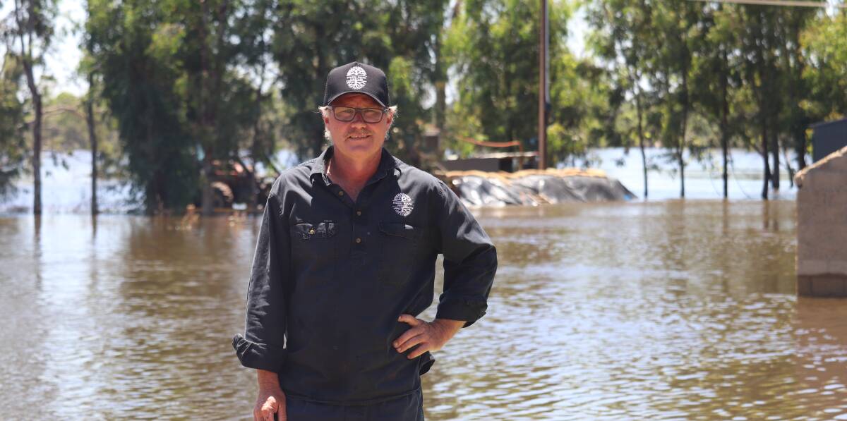Starrs Reach Vineyard manager Craig Alm in front of his sheds at Pyap in January during the flood. Picture by Liam Wormald 