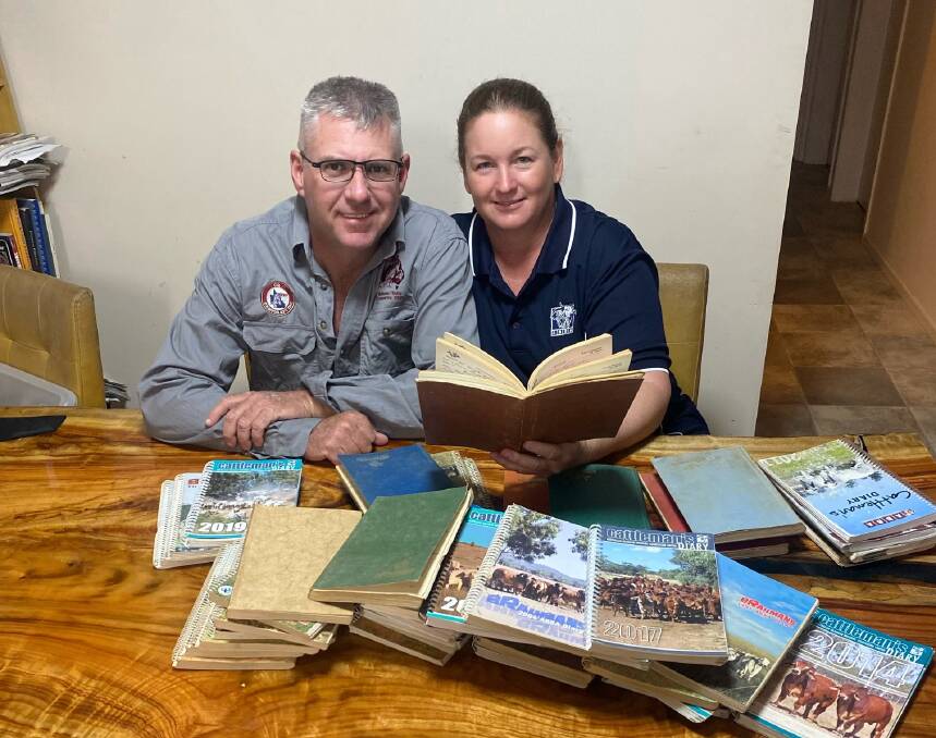Wade Clein and Sharon Atkinson of Bundarra Station, Nebo, with 47 years worth of ABBA Cattleman's diaries. Picture: Supplied