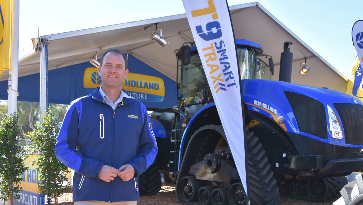 SMARTER TRACK:  Marc Smith, product manger high horse-power tractors, New Holland was on hand at CRT FarmFest showcasing the New Holland SmartTrax T9.670.