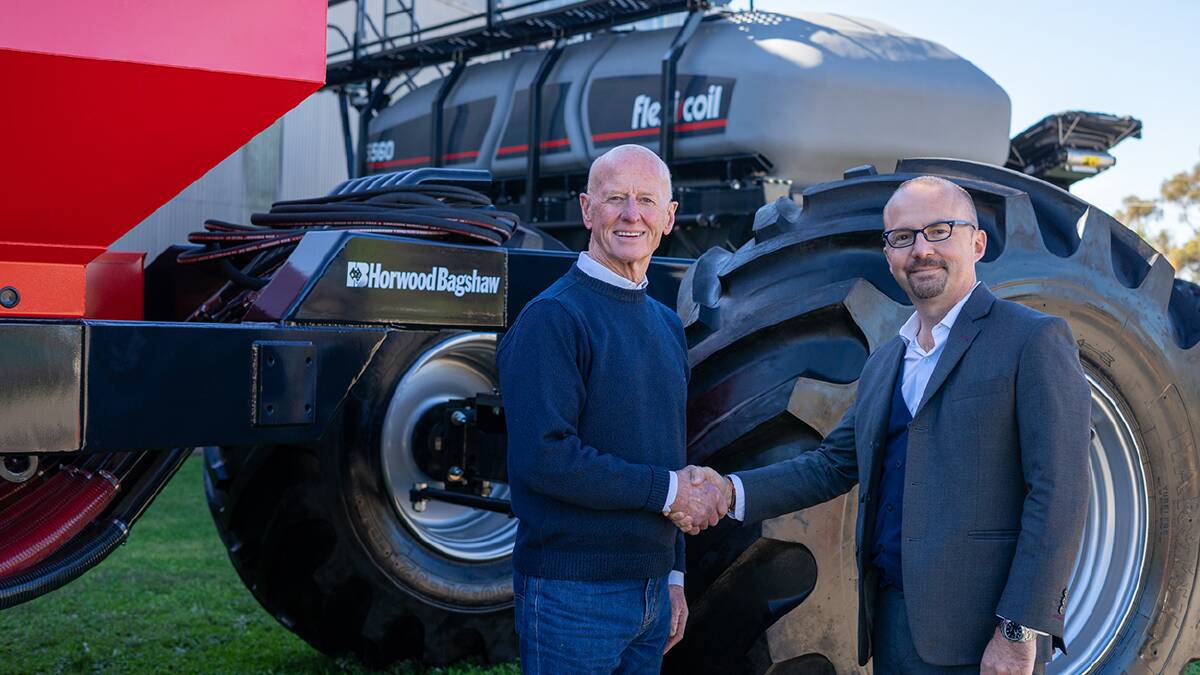 DONE DEAL: Peter Sweeney, managing director, Horwood Bagshaw with CNH Industrial, Australia and New Zealand, executive managing director, Michele Lombardi.